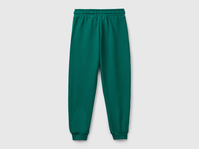 Фото ракурс 2 - Зелёные штаны для девочек Benetton артикул 3J68CF02H.G 28Y 24A