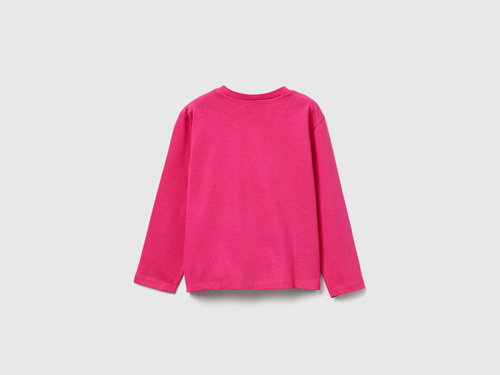 Фото ракурс 2 - Рожевий лонгслів Benetton для дівчаток артикул 35RYG10KC.P 1A2 25A