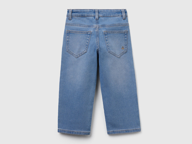 Фото ракурс 2 - Синие джинсы для мальчиков Benetton артикул 44LGGE02F.P 902 25A