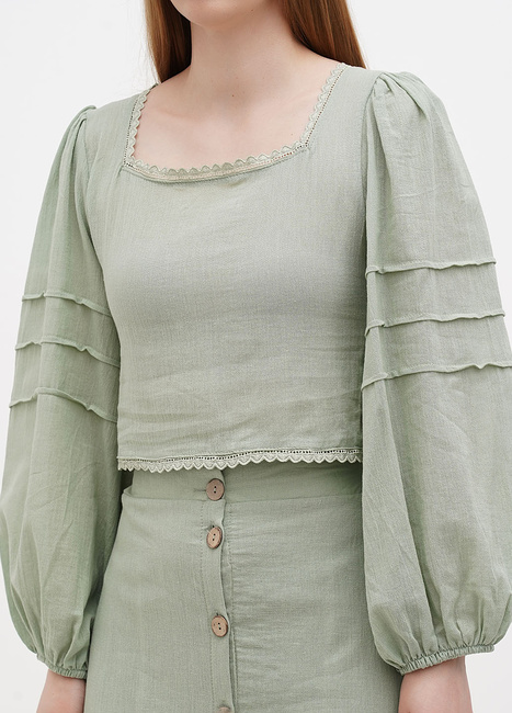 Фото ракурс 3 - Жіноча зелена блузка EQUILIBRI артикул W421 006 000 mint SS2024