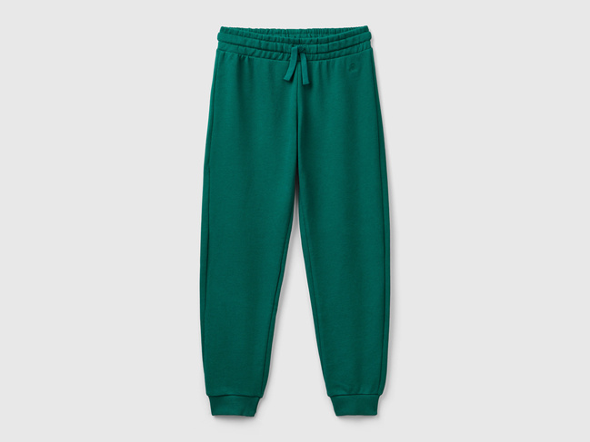 Фото ракурс 1 - Зелёные штаны для девочек Benetton артикул 3J68CF02H.G 28Y 24A