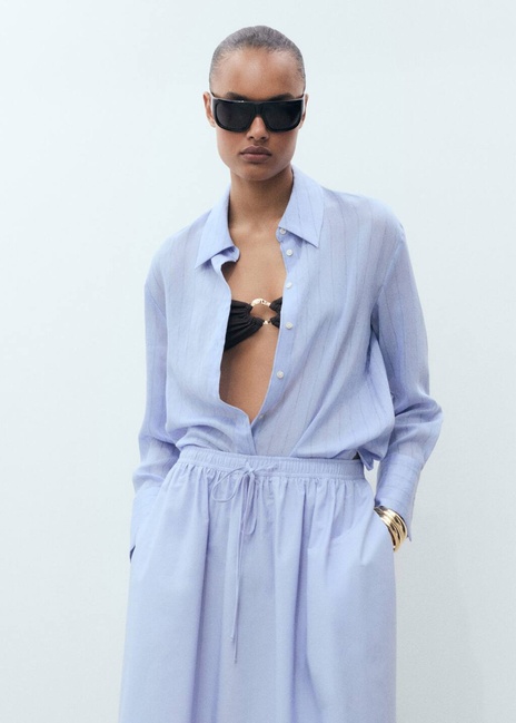 Женская голубая юбка Mango артикул 17061271 50 1 season Фото ракурс 4 - Женская голубая юбка Mango артикул 17061271 50 1 season