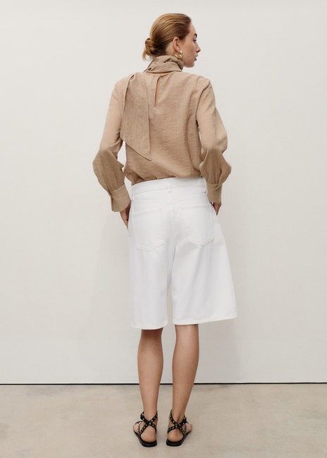 Женские белые шорты Mango артикул 17061180 01 1 season Фото ракурс 2 - Женские белые шорты Mango артикул 17061180 01 1 season