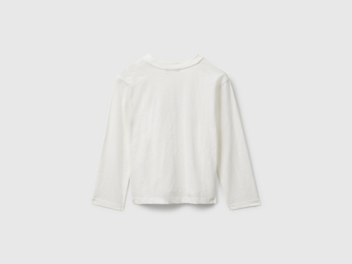 Фото ракурс 2 - Білий реглан Benetton для дівчаток артикул 35RYG10K7.P 074 25A