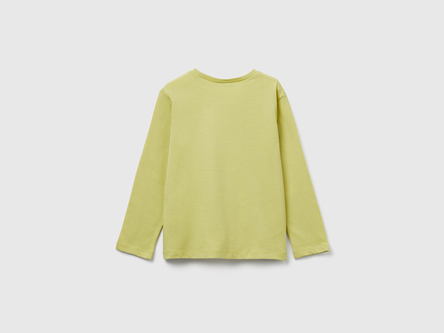 Фото ракурс 2 - Зелений лонгслів для дівчаток Benetton артикул 3JERG10KB.P 0Y6 25A