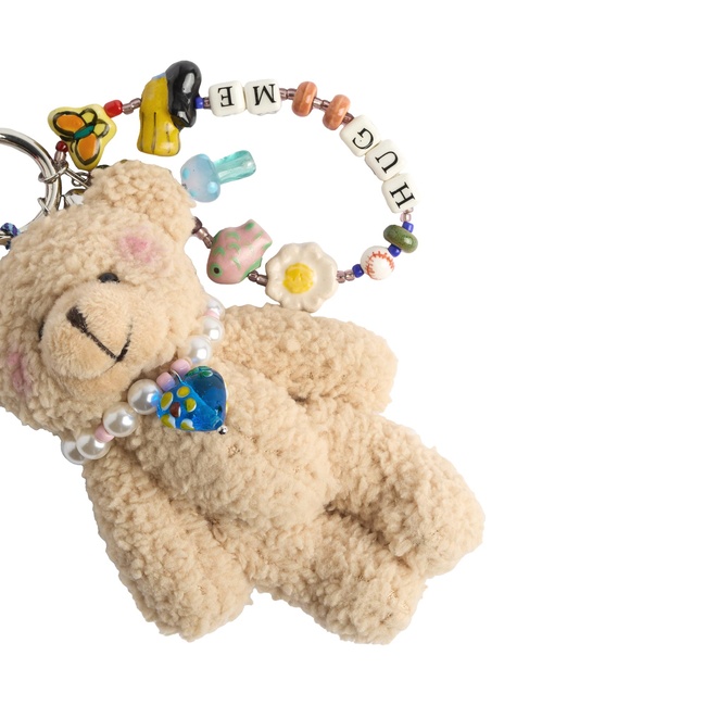 Фото ракурс 3 - Жіночий бежевий брелок Parfois артикул 229216 _HM FW2025