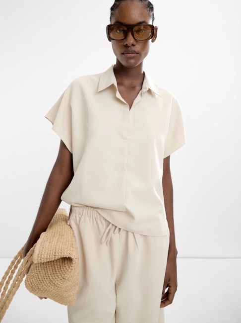 Фото ракурс 1 - Жіноча молочна блузка Parfois артикул 236661 _EC FW2025