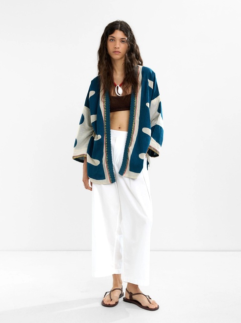 Женское синее пончо Parfois артикул 234104 _BM FW2025 Фото ракурс 1 - Женское синее пончо Parfois артикул 234104 _BM FW2025