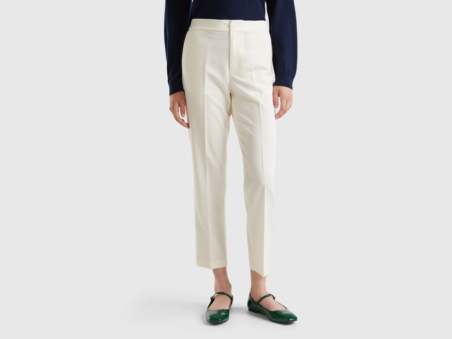 Фото ракурс 1 - Женские бежевые штаны Benetton артикул 4OIGDF076 0R2 24A