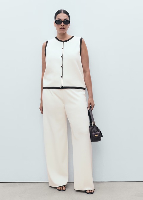 Женский молочный жилет Mango артикул 17044084 05 1 season Фото ракурс 6 - Женский молочный жилет Mango артикул 17044084 05 1 season