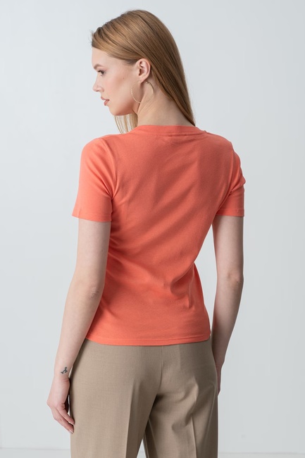 Фото ракурс 2 - Жіноча помаранчева футболка Benetton артикул 3GA2D1066 17W 25P