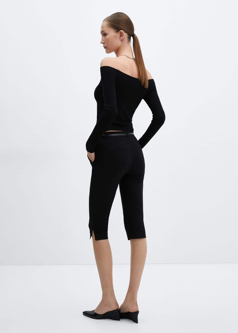 Фото ракурс 2 - Женские черные леггинсы Mango артикул 67086002 99 6 season