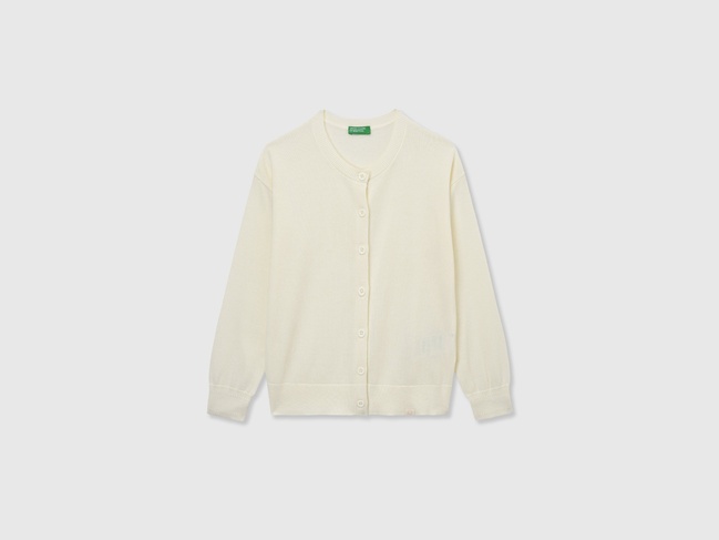 Фото ракурс 1 - Білий кардиган для дівчаток Benetton артикул 19DKC500Y.G 074 25A