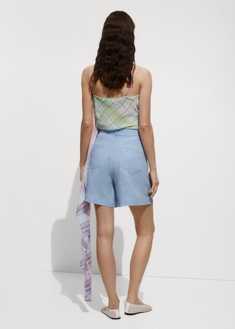 Женские голубые шорты Mango артикул 77030348 50 7 season Фото ракурс 2 - Женские голубые шорты Mango артикул 77030348 50 7 season
