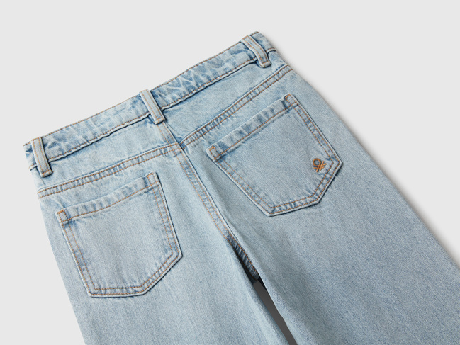 Сині джинси для дівчаток Benetton артикул 4AW7CE049.G 902 25A Фото ракурс 3 - Сині джинси для дівчаток Benetton артикул 4AW7CE049.G 902 25A