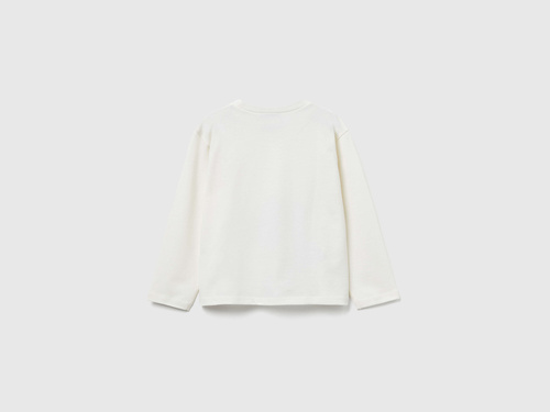 Фото ракурс 2 - Бежевий лонгслів Benetton для дівчаток артикул 35RYG10KC.P 0R2 25A