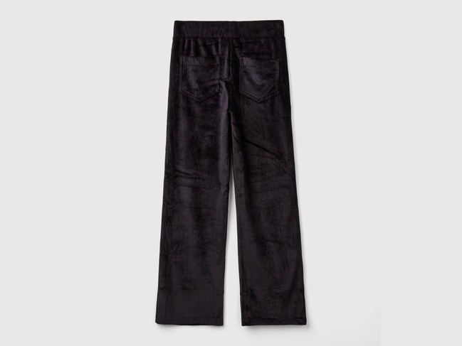 Фото ракурс 2 - Чорні штани для дівчаток Benetton артикул 37JBCF05J.G 100 24I