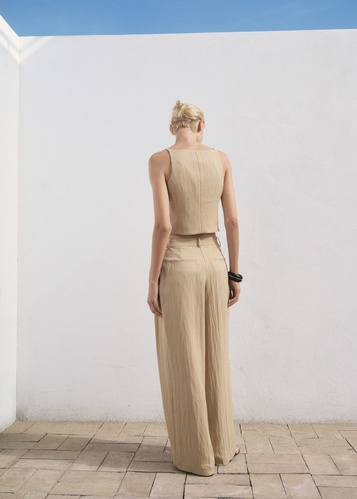 Фото ракурс 2 - Женские бежевые брюки Mango артикул 17042535 08 1 season