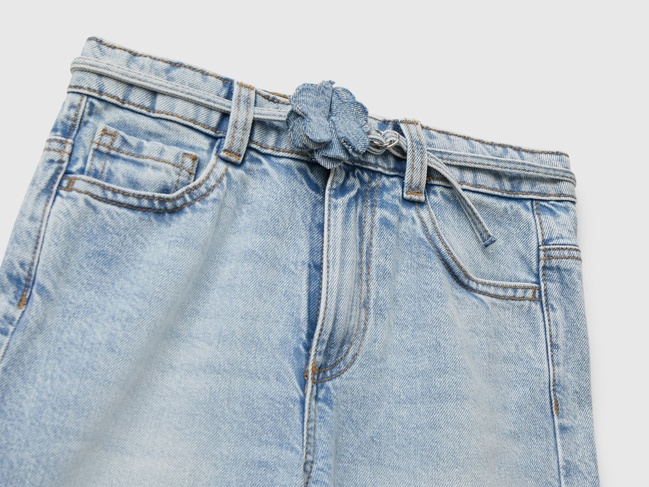 Фото ракурс 3 - Сині джинси для дівчаток Benetton артикул 4R76CF04U.G 901 25A