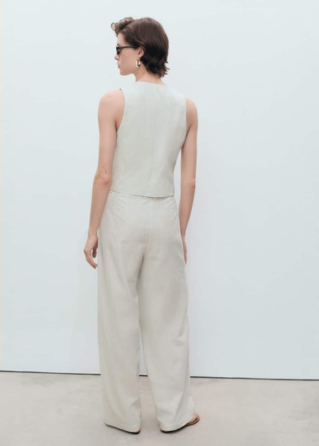 Женские молочные брюки Mango артикул 87038267 05 8 season Фото ракурс 2 - Женские молочные брюки Mango артикул 87038267 05 8 season