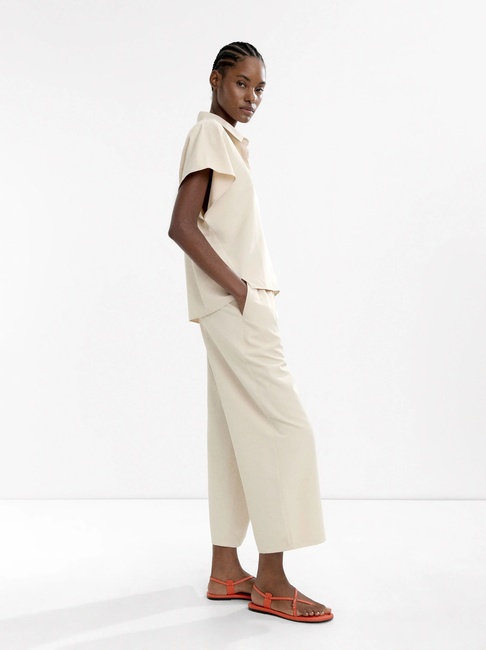 Фото ракурс 3 - Женские молочные штаны Parfois артикул 236663 _EC FW2025