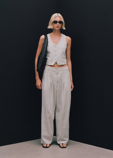 Женские молочные брюки Mango артикул 87038267 05 8 season Фото ракурс 6 - Женские молочные брюки Mango артикул 87038267 05 8 season