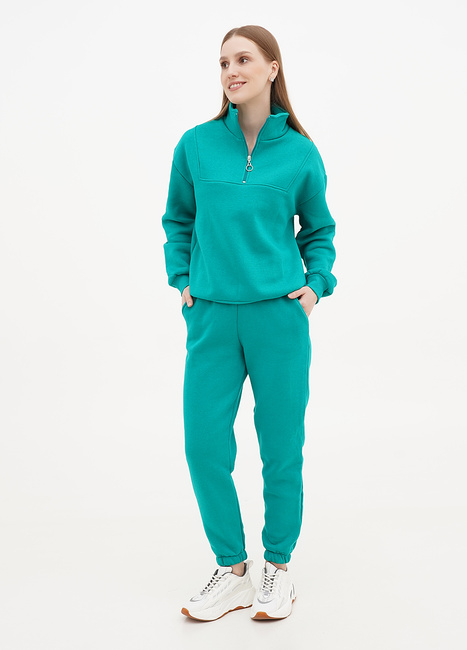 Фото ракурс 1 - Женские зелёные штаны EQUILIBRI артикул TFR FL JZ Dark green FW2024