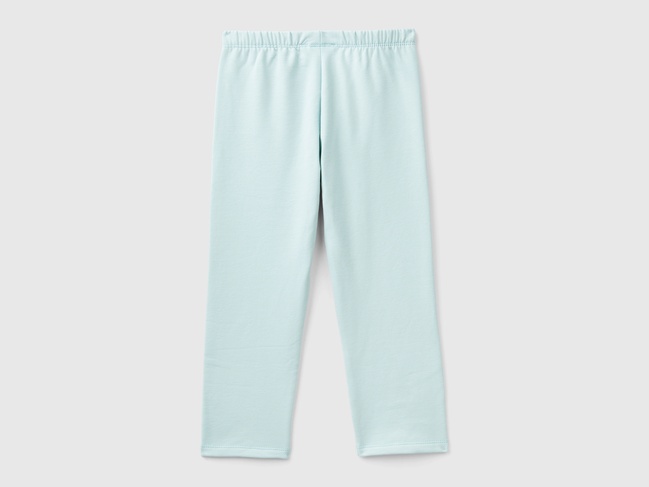 Фото ракурс 2 - Бірюзові лосини для дівчаток Benetton артикул 35Q2GF019.P 17H 24I
