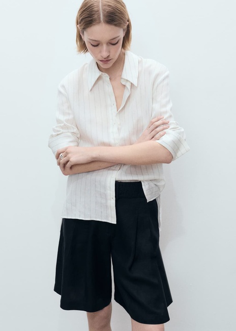 Жіночі чорні шорти Mango артикул 87058265 99 8 season Фото ракурс 4 - Жіночі чорні шорти Mango артикул 87058265 99 8 season