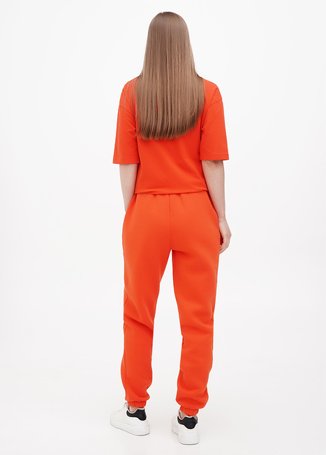 Фото ракурс 2 - Женские оранжевые штаны EQUILIBRI артикул OD Jogger Fleece AR Orange FW2024