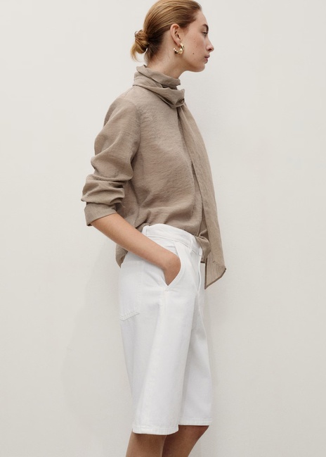 Женские белые шорты Mango артикул 17061180 01 1 season Фото ракурс 3 - Женские белые шорты Mango артикул 17061180 01 1 season