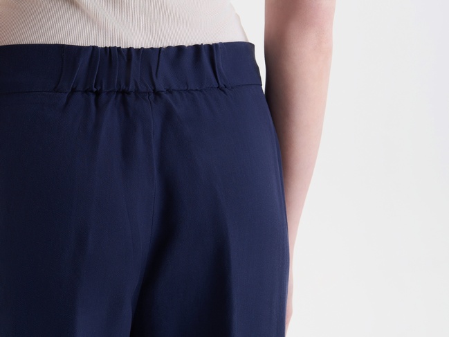 Фото ракурс 4 - Жіночі сині штани Benetton артикул 4T91DF099 252 25P