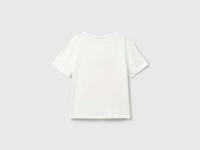 Біла футболка для дівчаток Benetton артикул 3X1SG10JV.P 074 25A Фото ракурс 2 - Біла футболка для дівчаток Benetton артикул 3X1SG10JV.P 074 25A