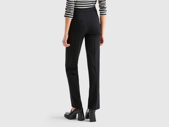 Фото ракурс 2 - Женские черные штаны Benetton артикул 47CKDF00H 100 24A