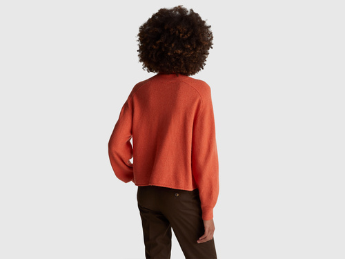 Фото ракурс 2 - Жіночий помаранчевий светр Benetton артикул 11CZD204F 0J2 25I