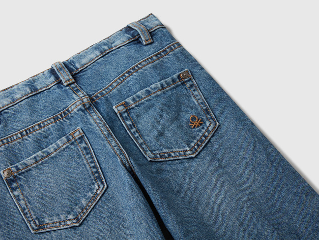 Синие джинсы для девочек Benetton артикул 488PGE02O.P 901 25A Фото ракурс 3 - Синие джинсы для девочек Benetton артикул 488PGE02O.P 901 25A