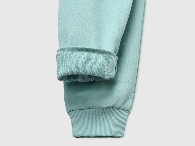 Фото ракурс 3 - Голубые штаны для девочек Benetton артикул 3J68CF02H.G 3Y1 25P