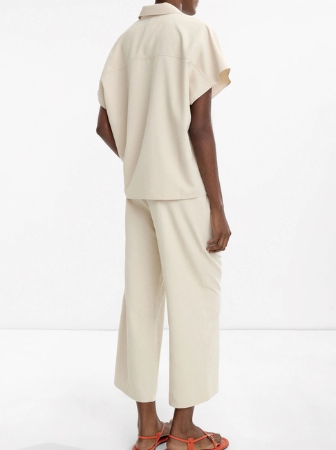 Фото ракурс 2 - Женские молочные штаны Parfois артикул 236663 _EC FW2025