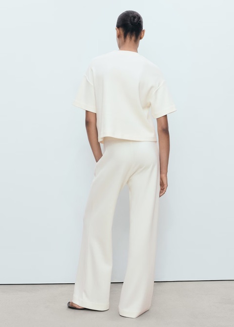 Женские молочные брюки Mango артикул 17084095 05 1 season Фото ракурс 2 - Женские молочные брюки Mango артикул 17084095 05 1 season