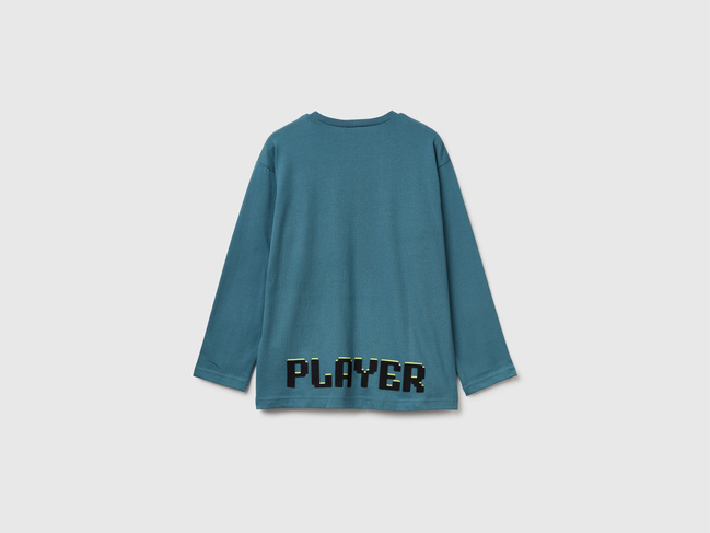 Фото ракурс 2 - Бирюзовый лонгслив для мальчиков Benetton артикул 3ATNC10RL.G 19W 25I